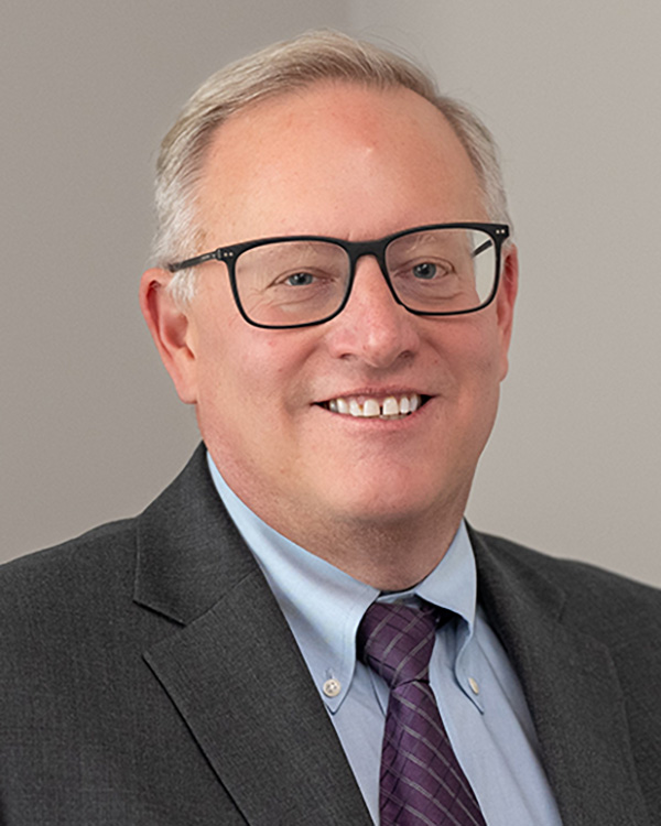 Commissioner Michael Caljouw